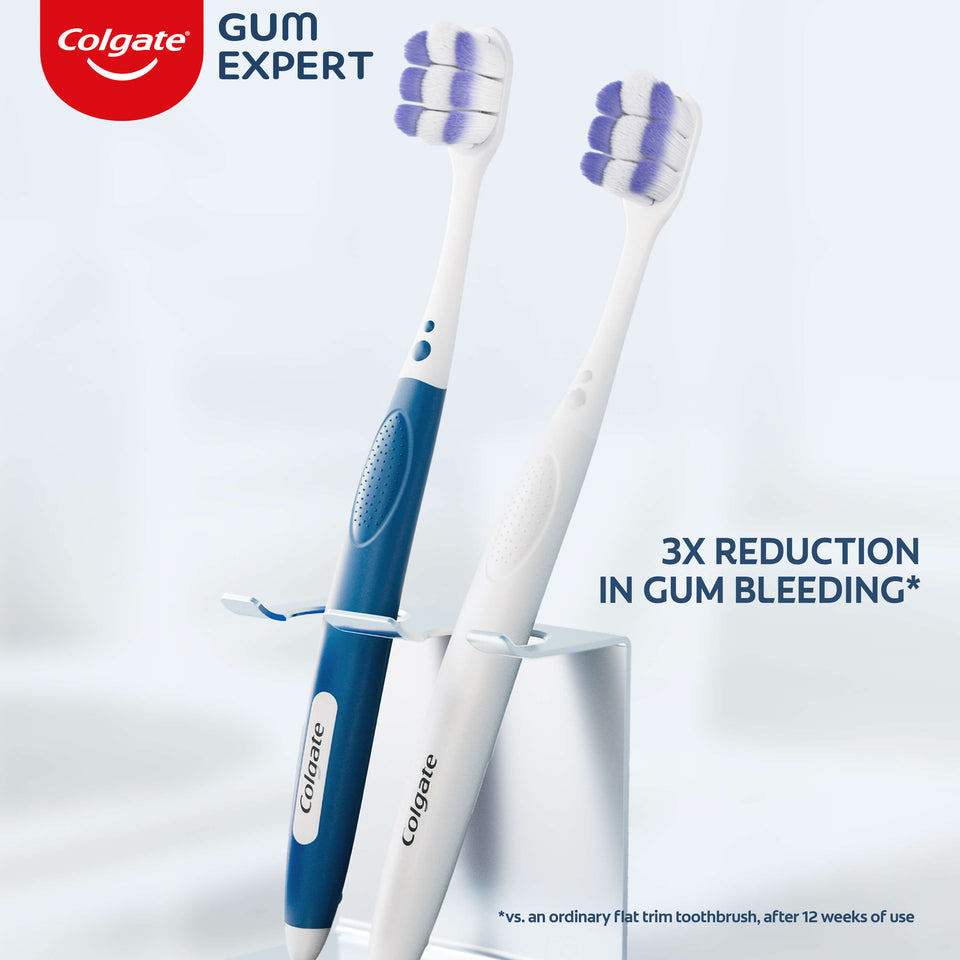 Two Colgate Gum Expert Ultra Soft Toothbrushes. In text: 3X reduction in gum bleeding*. *vs. an ordinary flat trim toothbrush, after 12 weeks of use.