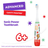 The head of a Colgate Kids Advanced Cavity Fighter Battery Toothbrush. In text: 5x more plaque removal*. *Along the gum line vs. a manual toothbrush.