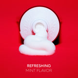 Colgate Optic White Renewal High Impact White Toothpaste being squeezed out of a tube. In text: Refreshing mint flavor.