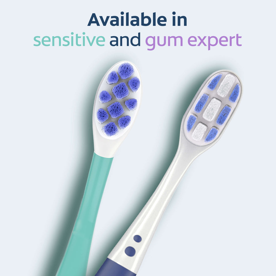 A Colgate Gum Expert Ultra Soft Toothbrush and a Colgate Sensitive Expert Toothbrush. In text: Available in sensitive and gum expert.