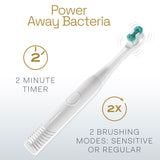 White Colgate Total Battery Powered Toothbrush. In text: Power Away Bacteria. 2 Minute Timer. 2 Brushing Modes: Sensitive or Regular.